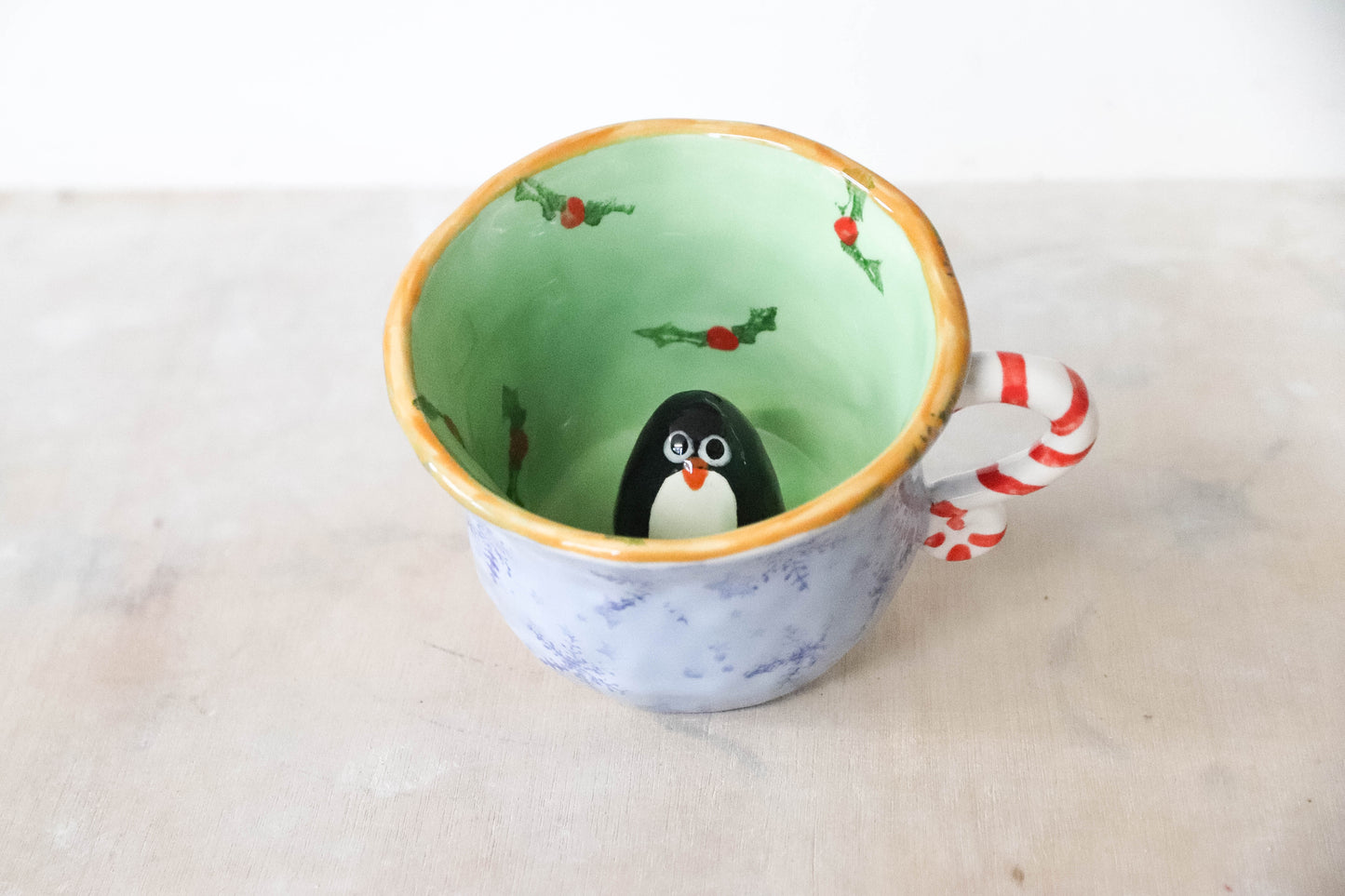 Peekaboo Penguin Toasty Grinch Mug