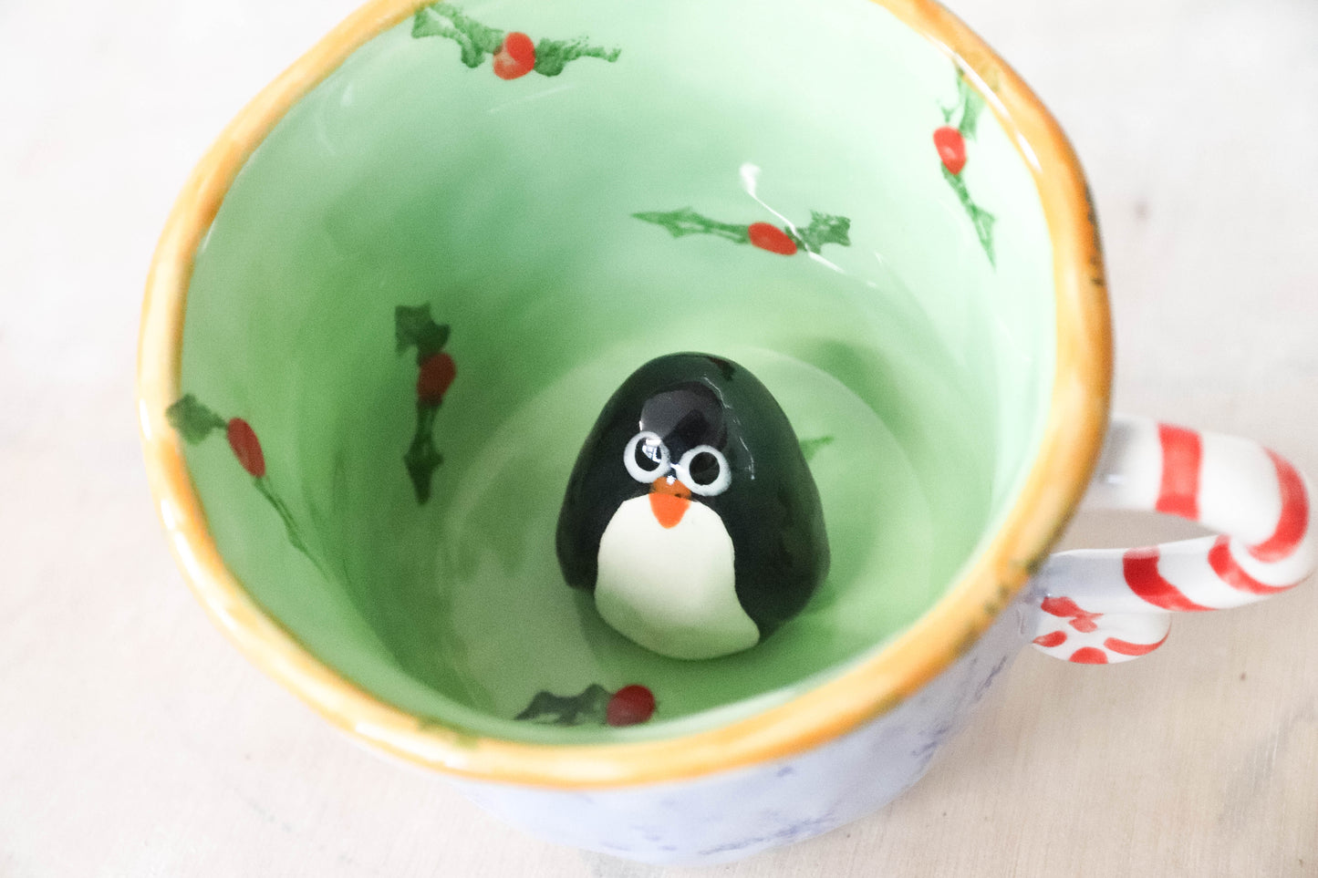 Peekaboo Penguin Toasty Grinch Mug