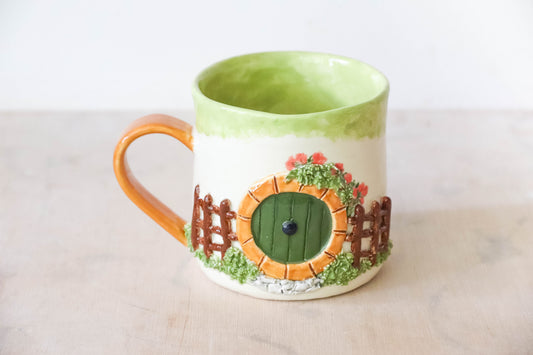Hobbit House Fence Round Mug