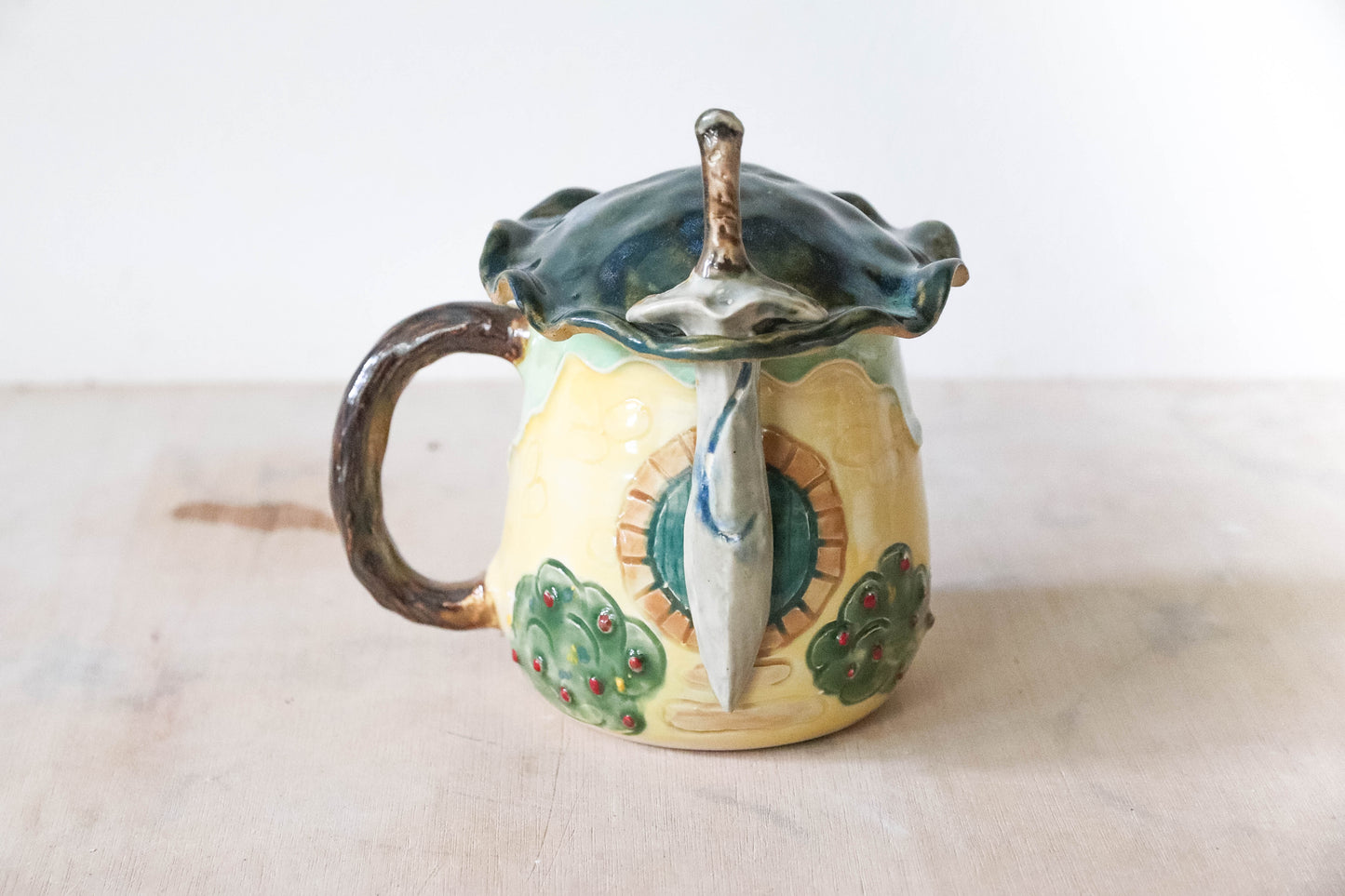 Yellow Hobbit House Sword Stoneware Pot
